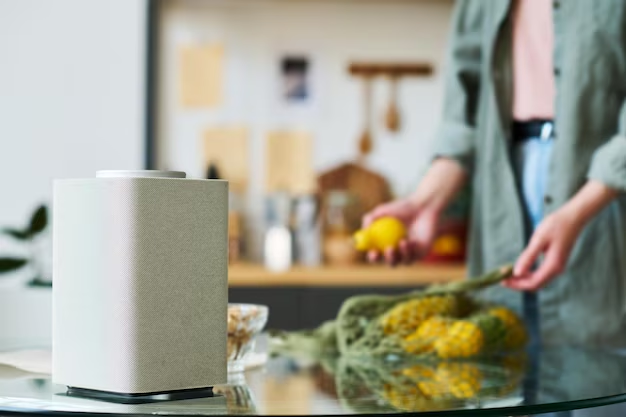 Woman cooking in the kitchen with an air purifier nearby